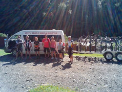 Mountain bikers about to depart on their Pakihi Track adventures from Bushaven