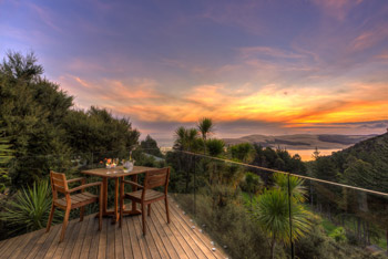 Kokohuia Lodge - Deck at sunset